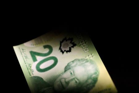 Canadian dollar falls after dovish BoC rate hike