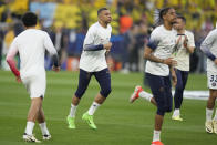 PSG's Kylian Mbappe warms up before the Champions League semifinal first leg soccer match between Borussia Dortmund and Paris Saint-Germain at the Signal-Iduna Park stadium in Dortmund, Germany, Wednesday, May 1, 2024. (AP Photo/Matthias Schrader)