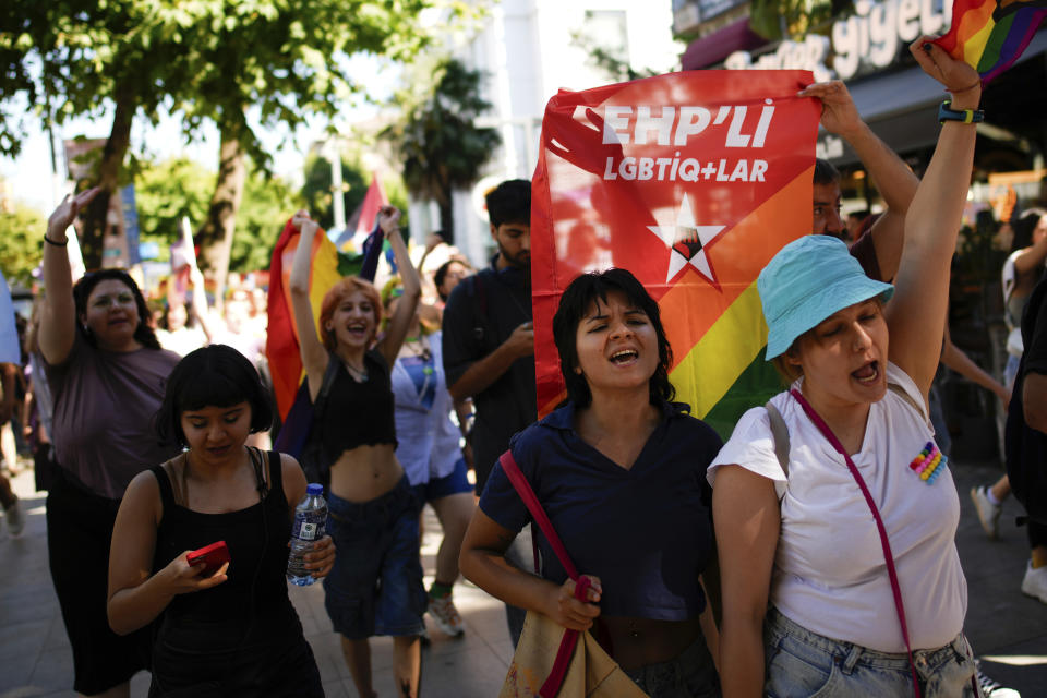 People shout slogans during the annual LGBTQ+ Pride March in Istanbul, Turkey, Sunday, June 30, 2024. (AP Photo/Emrah Gurel)