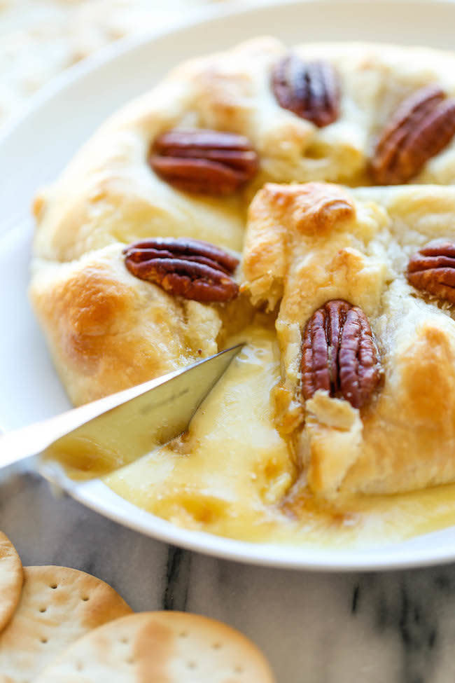 <strong>Get the <a href="http://damndelicious.net/2014/11/24/pumpkin-pecan-baked-brie/" target="_blank">Pumpkin Pecan Baked Brie recipe</a> from Damn Delicious</strong>