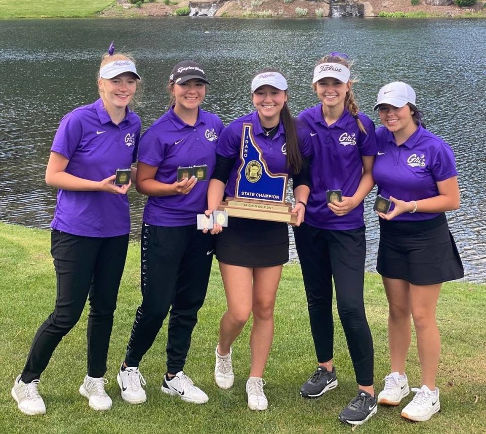 The Rocky Mountain girls golf team poses with its 5A state championship Tuesday at the Avondale Golf Club in Hayden.