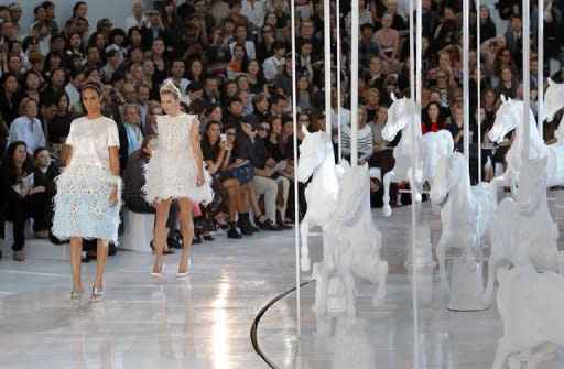 A model displays a creation by U.S. designer Marc Jacobs for