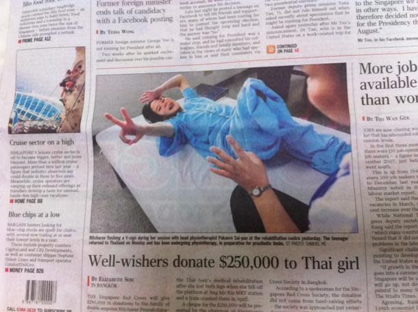 Thai teen Nitcharee Peneakchanasak whose legs were crushed by an MRT train will receive a cheque from the Singapore Red Cross Society. (Yahoo! photo)