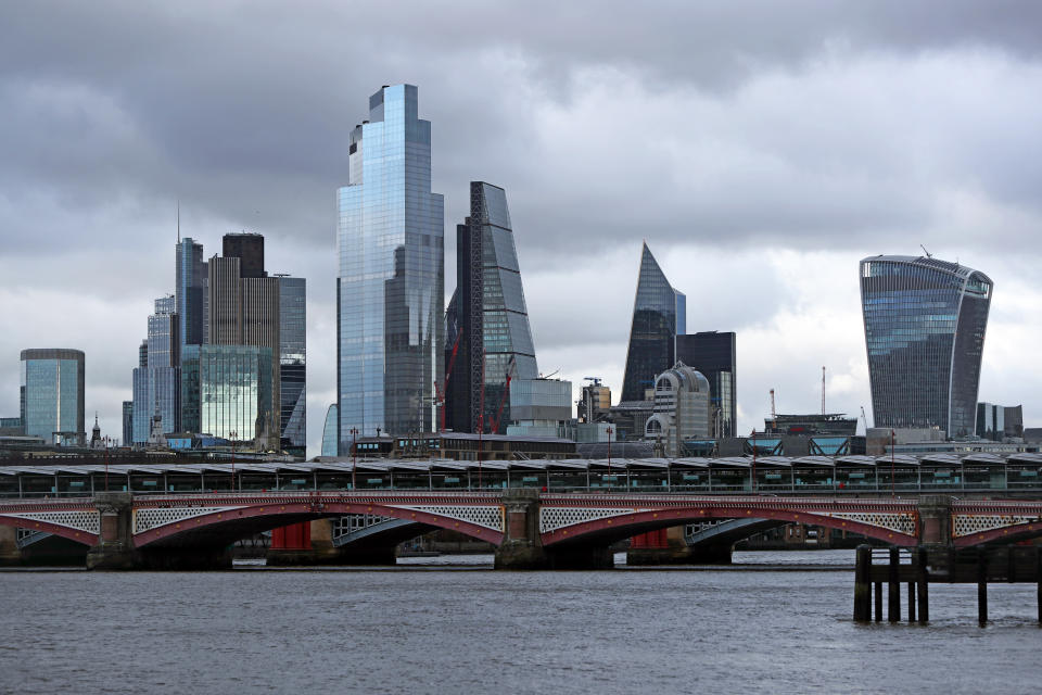 A general view of the buildings in London's primary financial district behind the River Thames.