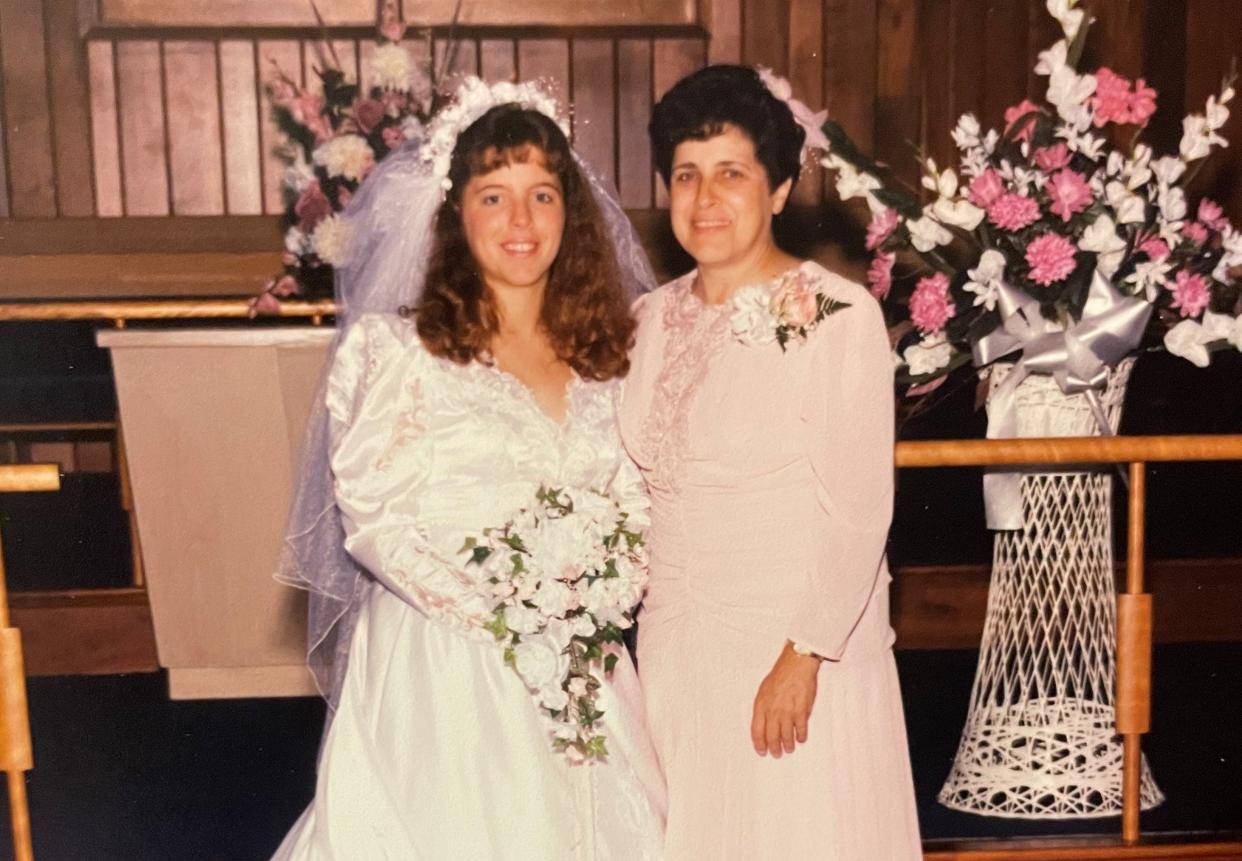 Becky White, left, poses at her wedding with her mother, the late Patricia Moniz. Moniz was allegedly killed by Amber Nelson in the first week of July in Hendersonville.