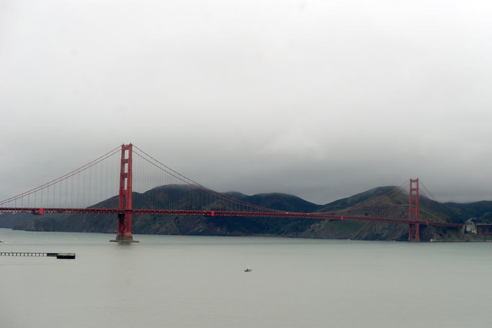 The Golden Gate Bridge is pictured from a helicopter following US President Barack Obama in San Francisco, California, on April 4, 2013. Obama is in California to attend two DCCC fund rising events. AFP PHOTO/Jewel Samad 