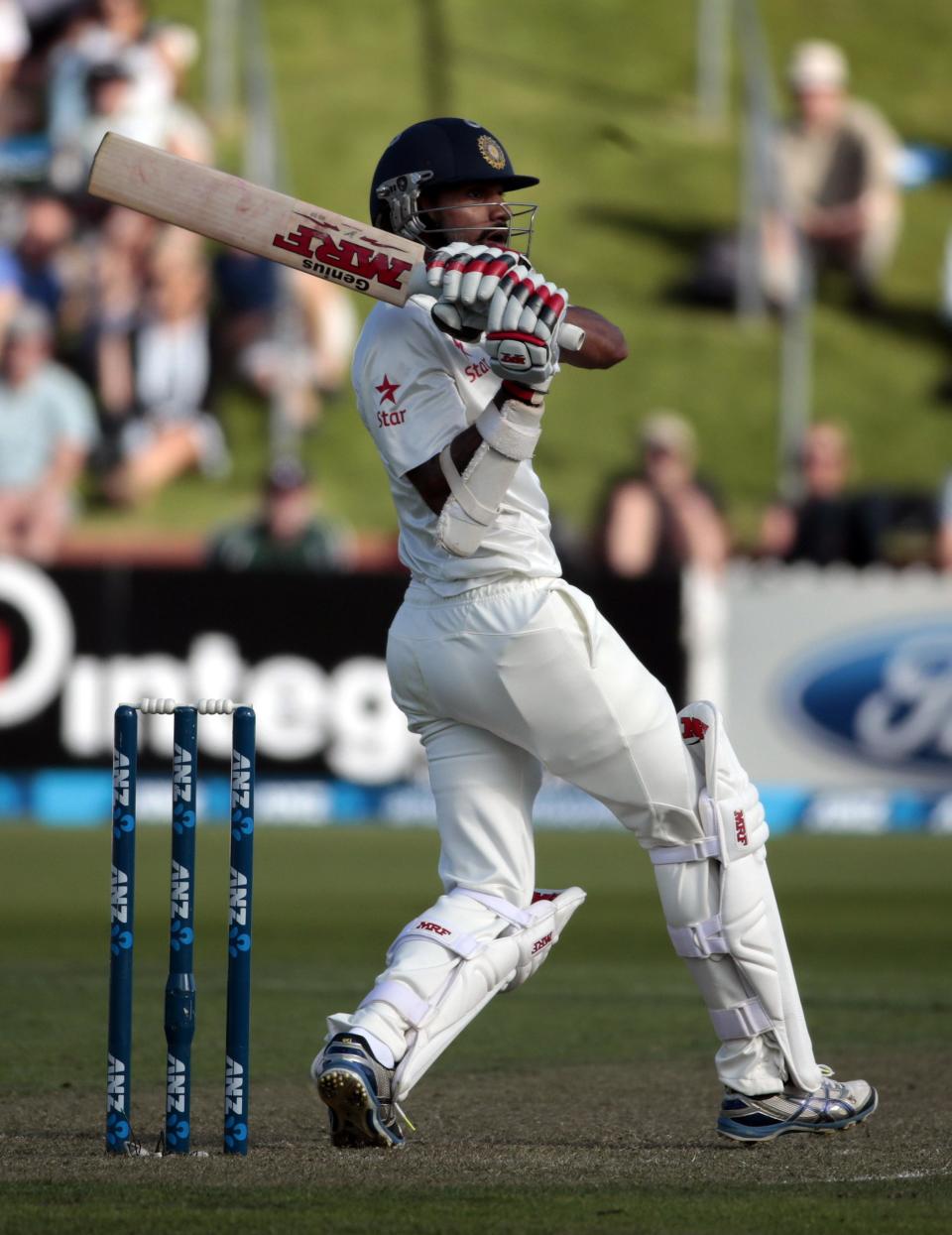 India's Shikhar Dhawan plays a shot against New Zealand during the first innings on day one of the second international test cricket match at the Basin Reserve in Wellington, February 14, 2014.