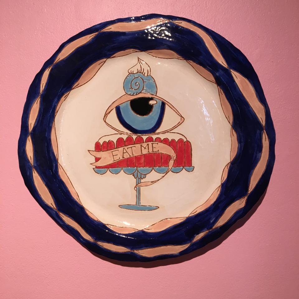 "Eat Me," ceramic, by Dana Sherwood.