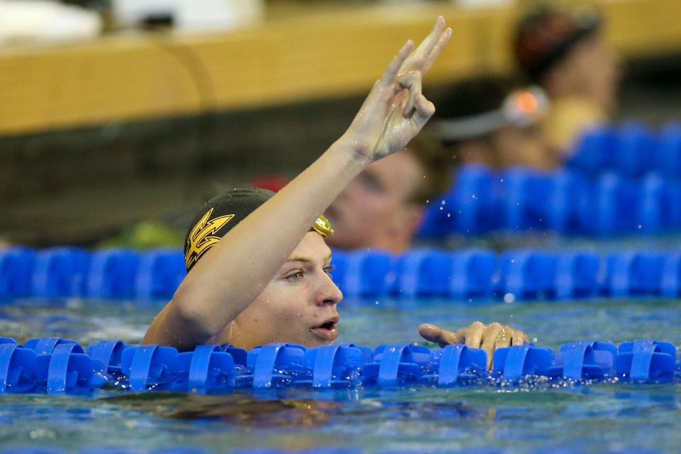 Mar 24, 2022; Atlanta, GA, USA; Arizona State Sun Devils swimmer Leon Marchand celebrates after winning the 200 IM final in the NCAA Men's Swimming & Diving Championships at McAuley Aquatic Center.