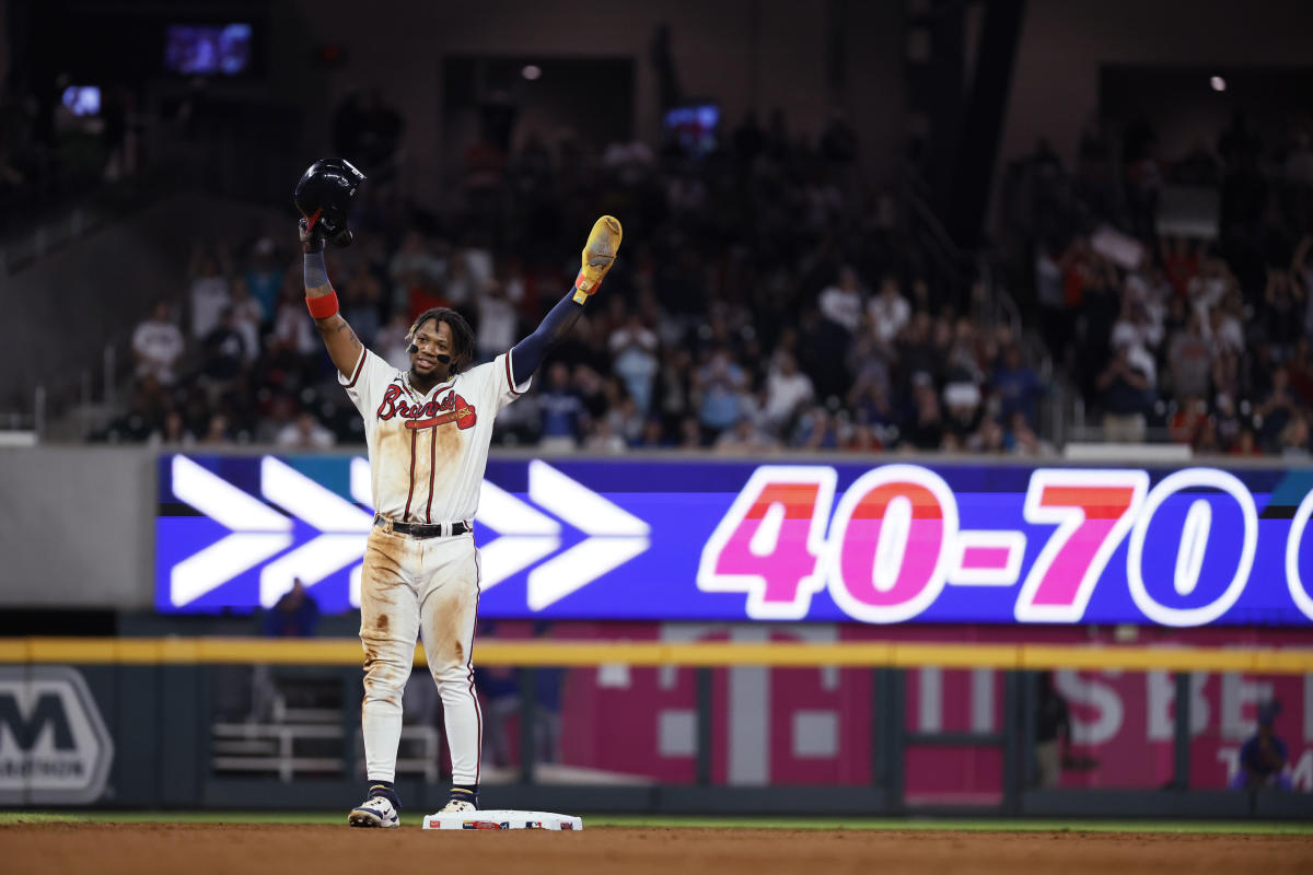 A security guard takes a ball from a little kid at the Braves-Pirates game  - NBC Sports