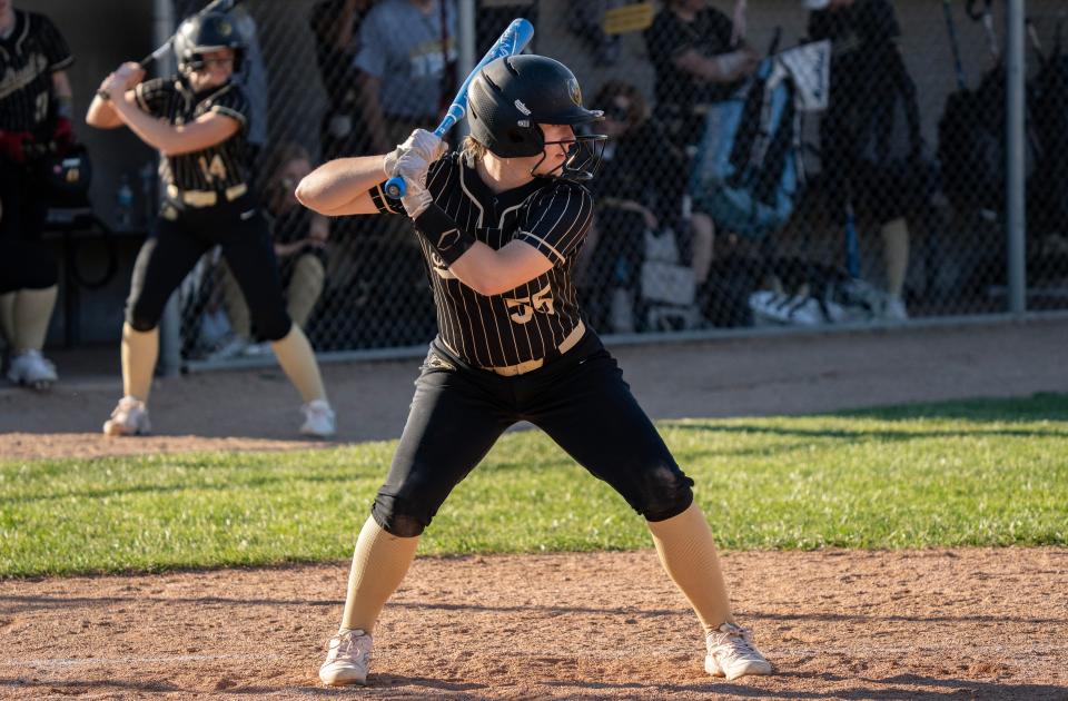 Shelbyville sophomore Addison Stieneker takes an at bat during Wednesday's evening game at Shelbyville High School. The Shelbyville Golden Bears took on the Center Grove Trojans in a tough high school softball matchup Wednesday, April 12, 2023, in Shelbyville, Ind. with the Trojans winning 3-1 over the Golden Bears.