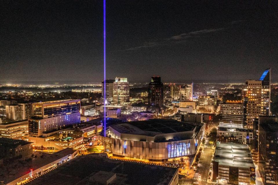 The beam shines from Golden 1 Center in downtown Sacramento after the Kings defeated the Golden State Warriors during an NBA in-season tournament game in November.