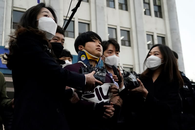 Cho Ju-bin, leader of South Korea's online sexual blackmail ring which is so called 'Nth room', walks out of a police station as he is transferred to a prosecutor's office in Seoul