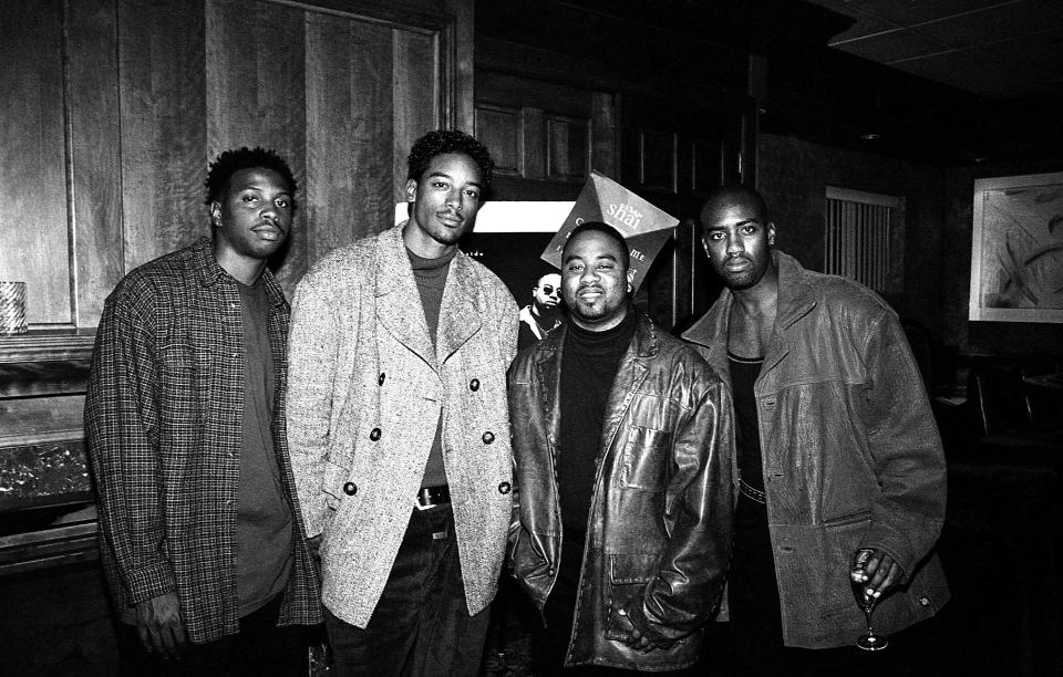 Singers Darnell Van Rensalier, Garfield Bright, Marc Gay and Carl Martin of Shai poses for photos backstage at Magnum's in Chicago, Illinois