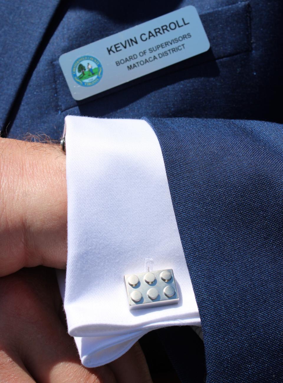 Kevin Carroll, Chesterfield County Board of Supervisors Chairman, sports LEGO cufflinks at the LEGO Manufacturing Richmond groundbreaking ceremony in Chester, Va. on April 13, 2023.