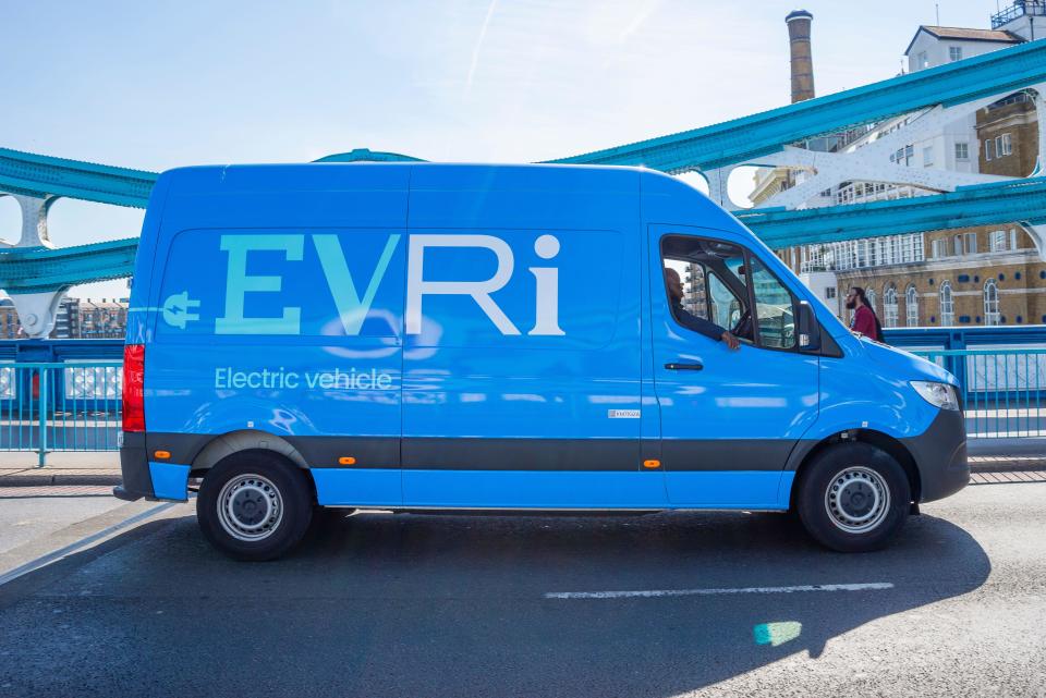 EVRi electric vehicle driving in London. Formerly Hermes. EVRi electric van crossing Tower Bridge. Mercedes eSprinter ev