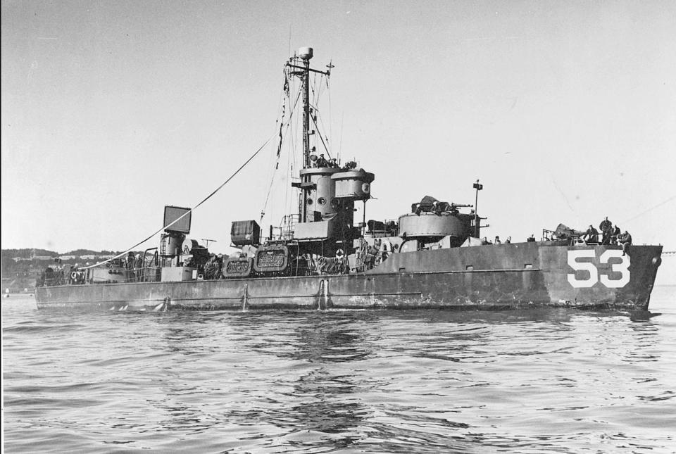 USS LCS-53 underway in San Francisco Bay in 1946. Ensign J. William Middendorf II of the U.S. Naval Reserve is the tall man on the bridge.