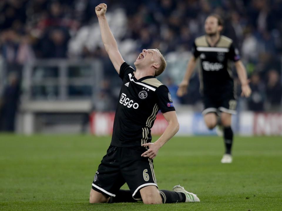 Ajax's Donny van de Beek celebrates at the end of the Champions League, quarterfinal, second leg soccer match between Juventus and Ajax, at the Allianz stadium in Turin, Italy, Tuesday, April 16, 2019. Ajax won 2-1 and advances to the semifinal on a 3-2 aggregate. (AP Photo/Luca Bruno)