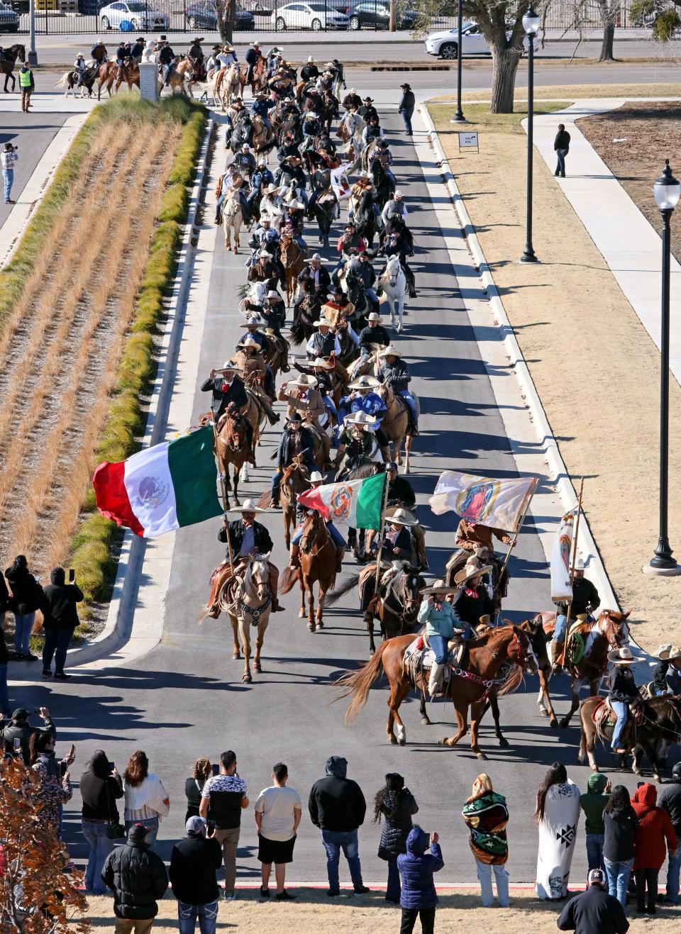 Horses and riders participate in a processional for the feast day of St. Juan Diego on Saturday as it ends at Tepeyac Hill at the Blessed Stanley Rother Shrine on in Oklahoma City. Mandatory Credit: Steve Sisney-The Oklahoman
(Credit: Steve Sisney for The Oklahoman)