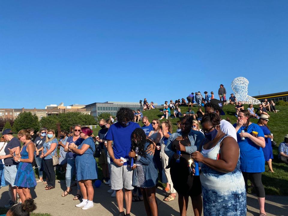 Hundreds attended a vigil for beloved Des Moines Public Schools teacher and mentor, Kristopher Rollins, on August 22, 2021 in downtown Des Moines.