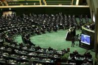 Iranian President Hassan Rouhani speaks during the opening ceremony of Iran's 11th parliament, as the spread of the coronavirus disease (COVID-19) continues, in Tehran