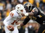 COLUMBIA, MO - NOVEMBER 12: Quarterback David Ash #14 of the Texas Longhorns is sacked by Terrell Resonno #93 of the Missouri Tigers during the game on November 12, 2011 at Faurot Field/Memorial Stadium in Columbia, Missouri. (Photo by Jamie Squire/Getty Images)