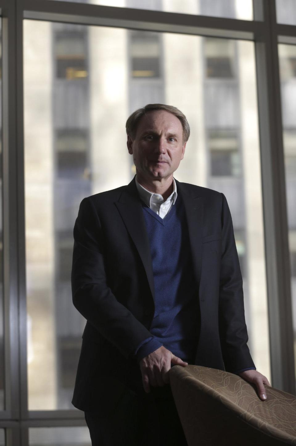 In this Monday, May 13, 2013 photo, author Dan Brown poses for a portrait in New York. His new book, "Inferno," published by Doubleday releases on May 14, 2013. (AP Photo/Seth Wenig)