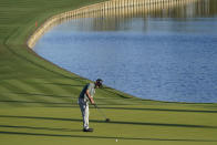 Brian Harman putts on the 18thth hole during the first round of the The Players Championship golf tournament Thursday, March 11, 2021, in Ponte Vedra Beach, Fla. (AP Photo/John Raoux)