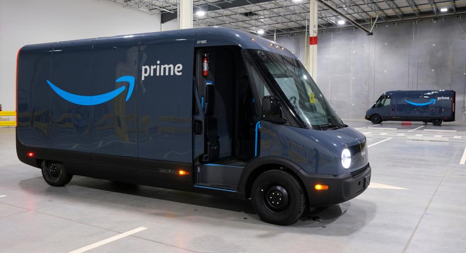 An Amazon electric delivery truck is photographed in March 2023 at a facility in Oklahoma City. Amazon said its drivers are not permitted to carry firearms while making deliveries regardless of state and local laws after driver shot and injured a dog in Alabama.