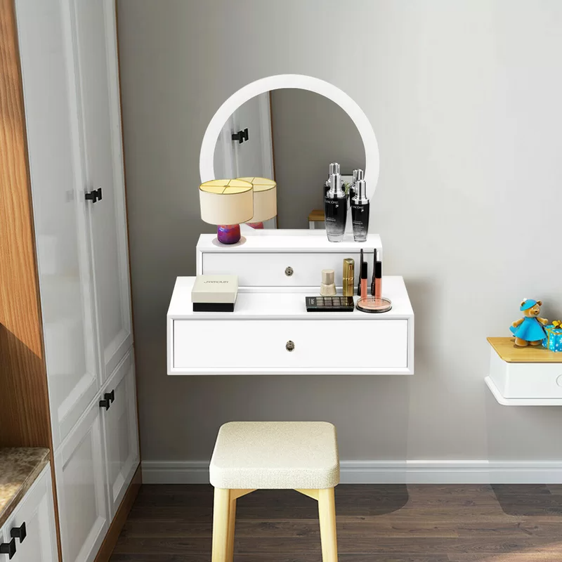 <h3>Aakiyah Wall Mounted Vanity Mirror</h3><br><strong>When making space for a vanity is feels in vain</strong>: Not all vanities are cumbersome sets — this wall-mounted system was made to be a small-space star with its storage drawers for stowing away hair tools and daily accessories and built-in mirror for getting gussied up. <br><br><em>Shop <a href="https://www.wayfair.com/decor-pillows/pdp/ebern-designs-aakiyah-wall-mounted-beveled-vanity-mirror-w006705339.html" rel="nofollow noopener" target="_blank" data-ylk="slk:Wayfair" class="link "><strong>Wayfair</strong></a></em><br><br><strong>Ebern Designs</strong> Aakiyah Wall Mounted Beveled Vanity Mirror, $, available at <a href="https://go.skimresources.com/?id=30283X879131&url=https%3A%2F%2Fwww.wayfair.com%2Fdecor-pillows%2Fpdp%2Febern-designs-aakiyah-wall-mounted-beveled-vanity-mirror-w003346160.html" rel="nofollow noopener" target="_blank" data-ylk="slk:Wayfair" class="link ">Wayfair</a>