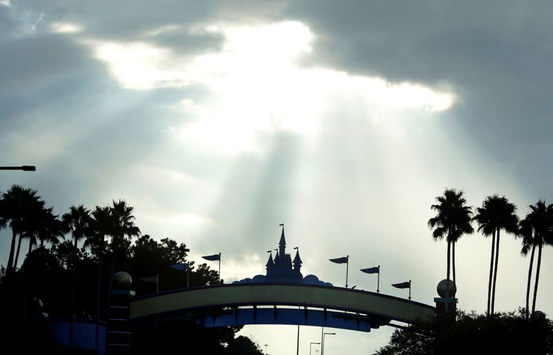 FILE PHOTO: Sunlight breaks through clouds near Disney World ahead of the arrival of Hurricane Irma, in Kissimmee