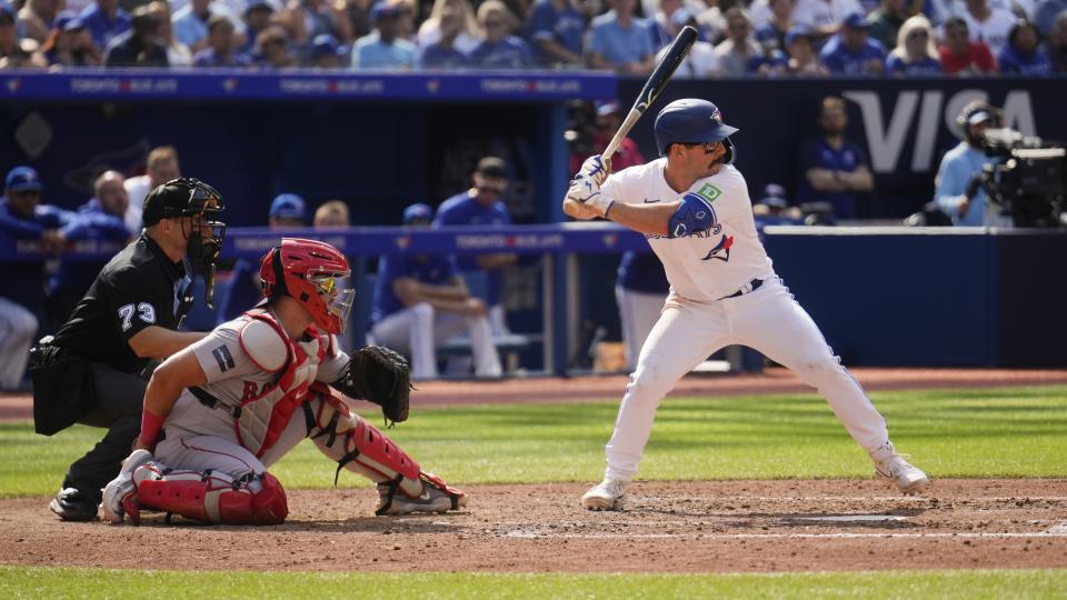 Davis Schneider is one of the reasons the Blue Jays have been earning more free passes lately. (Mark Blinch/Getty Images)