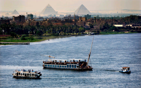 Holiday makers enjoy Nile cruises during Sham el-Nessim, or "smelling the breeze," in Cairo, Egypt - Credit: AP Photo/Amr Nabil