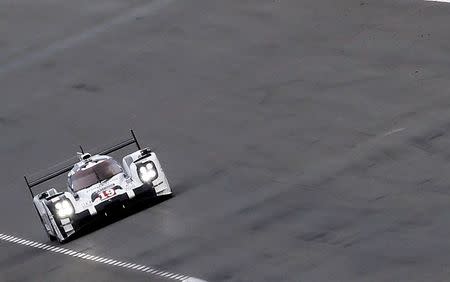 Nico Hulkenberg of Germany drives his Porsche 919 Hybrid number 19 during the Le Mans 24-hour sportscar race in Le Mans, central France June 13, 2015. REUTERS/Regis Duvignau