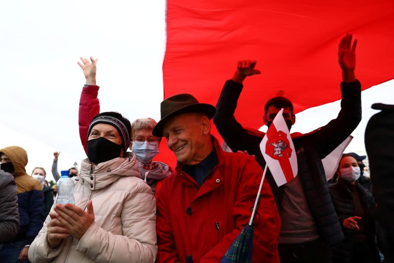 Belarusian opposition supporters hold a rally in Minsk