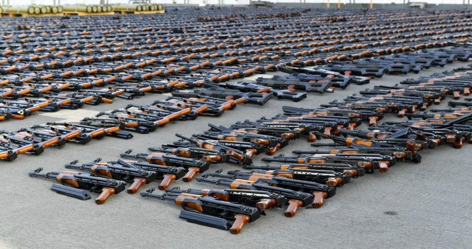 Rows of Chinese-made assault rifles.