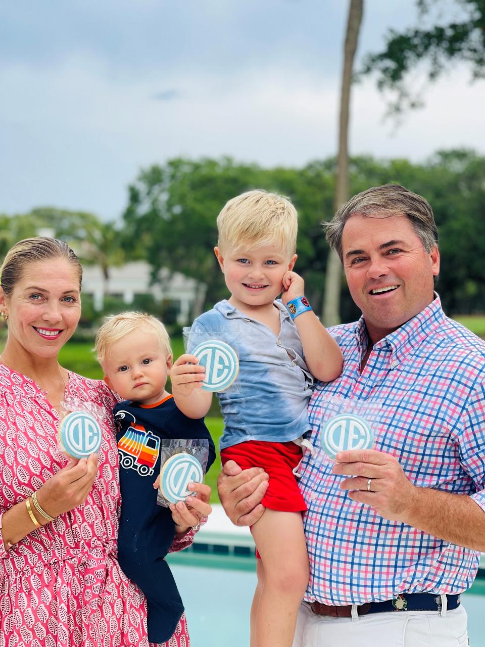 Michael Merrill, far right, with his wife Aurelija Merrill, left, and their two boys, Jack and Hudson.