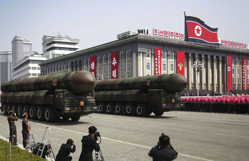 North Korea parades missiles during a parade in Pyongyang (Picture: REX)