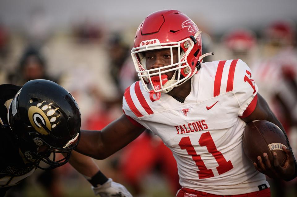 Seventy-First’s Deandre Nance tries to keep Gray's Creek’s Jaden Webb at bay as he runs the ball during the first quarter on Thursday, Sept. 21, 2023, at Gray’s Creek High School.