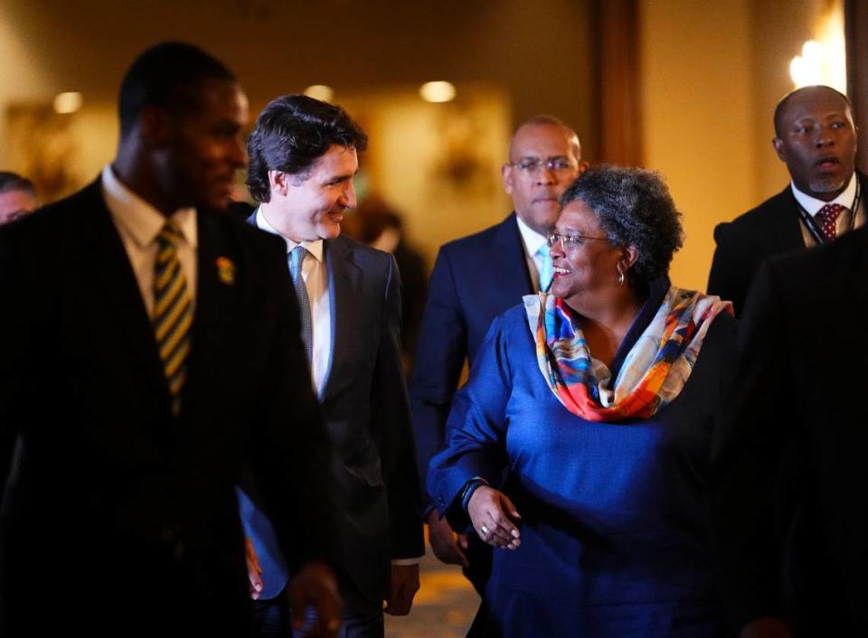 Canada Prime Minister Justin Trudeau walks with Prime Minister of Barbados Mia Mottley as they arrive at the opening ceremony of the Conference of Heads of Government of the Caribbean Community (CARICOM) in Nassau, Bahamas, on Wednesday, Feb. 15, 2023.