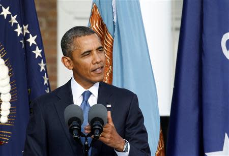 U.S. President Barack Obama delivers remarks during a memorial service for victims of the Washington Navy Yard shooting in Washington, September 22, 2013. REUTERS/Mary F. Calvert