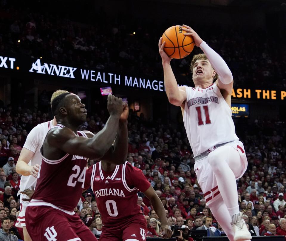 Wisconsin guard Max Klesmit goes up for a shot in the lane against Indiana during the second half Friday night at the Kohl Center. Klesmit scored 20 of his team-high 26 points during a 4-minute, 38-second span in the second half.