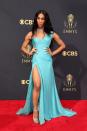 <p>Mj imagined herself in this <a href="https://www.popsugar.com/fashion/mj-rodriguez-blue-versace-dress-emmys-2021-48511305" class="link rapid-noclick-resp" rel="nofollow noopener" target="_blank" data-ylk="slk:turquoise number from the archives">turquoise number from the archives</a> for the 2021 Emmys, finished with Bulgari jewels.</p>