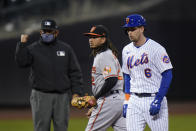 New York Mets' Jeff McNeil (6) walks away after being tagged out at second base by Baltimore Orioles' Freddy Galvis (2) during the third inning of a baseball game Tuesday, May 11, 2021, in New York. (AP Photo/Frank Franklin II)