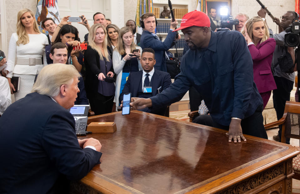 US President Donald Trump meets with rapper Kanye West (R) in the Oval Office of the White House in Washington, DC, on October 11, 2018. (Photo by SAUL LOEB / AFP)        (Photo credit should read SAUL LOEB/AFP/Getty Images)