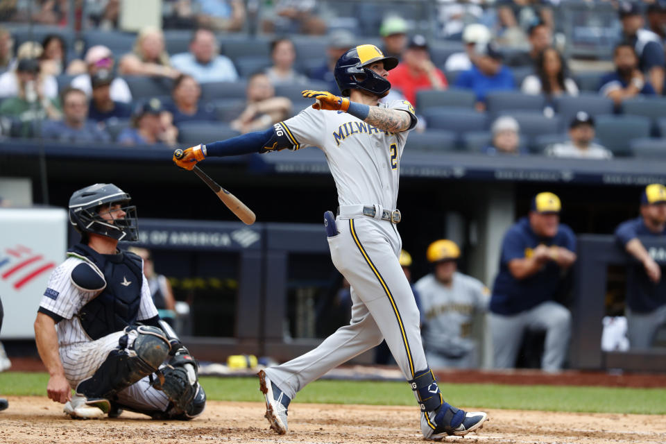 Milwaukee Brewers' Brice Turang (2) follows through on a double against the New York Yankees during the fifth inning of a baseball game, Sunday, Sept. 10, 2023, in New York. (AP Photo/Noah K. Murray)