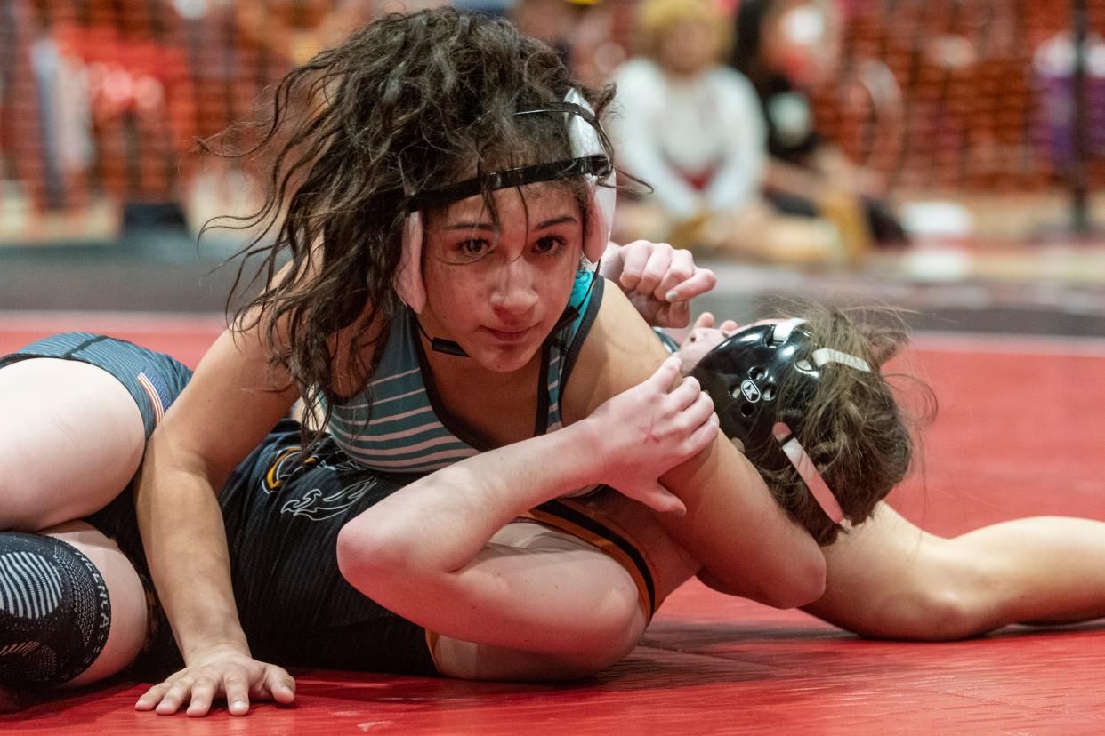 Sultana’s Nataly Diaz pins her opponent for the 116-pound title at the Mojave River League Finals on Friday, Feb. 3, 2023.