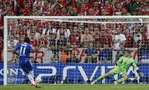 FILE - In this Saturday May 19, 2012 file photo Chelsea's Didier Drogba scores the decisive shootout penalty during the Champions League final soccer match between Bayern Munich and Chelsea in Munich, Germany. P is for Penalties. 11 finals have been decided in a penalty shootout. In this case Drogba scored the decisive penalty in the shootout as Chelsea beat Bayern Munich to win the Champions League final after a dramatic 1-1 draw. (AP Photo/Matt Dunham, File)