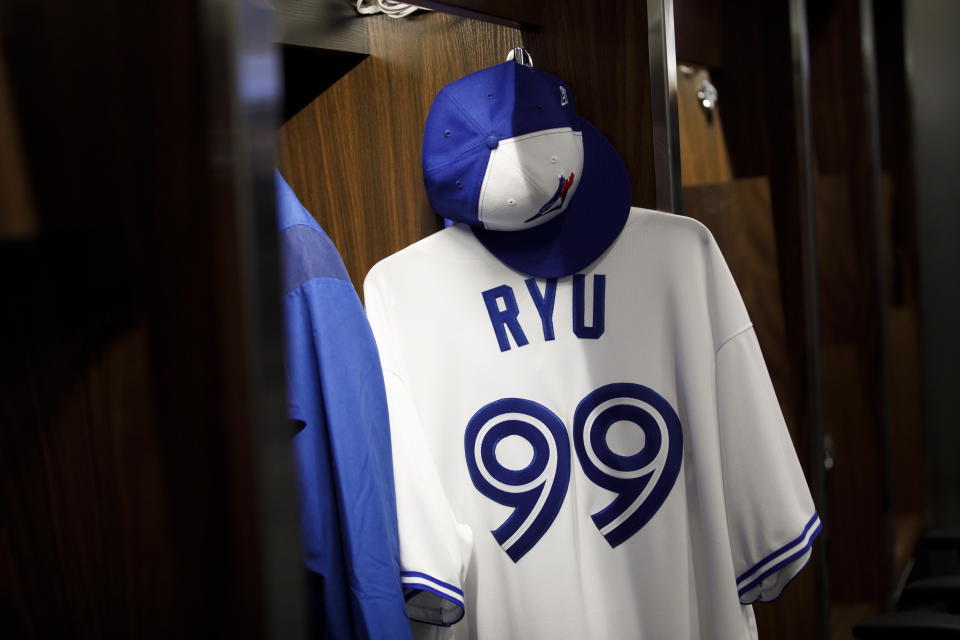 The locker of Toronto Blue Jays newly signed pitcher Hyun-Jin Ryu is viewed in the clubhouse following a news conference announcing his signing to the team in Toronto, Friday, Dec. 27, 2019. (Cole Burston/The Canadian Press via AP)