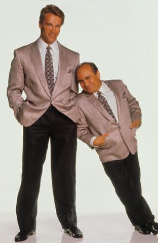 Moviestore/Shutterstock Arnold Schwarzenegger and Danny DeVito in Twins